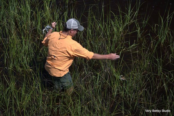 The flounder did not want to come into the grass and let me gill it. It took several attempts with trips back out into the creek each time. Yes I was holding my breath the whole time.