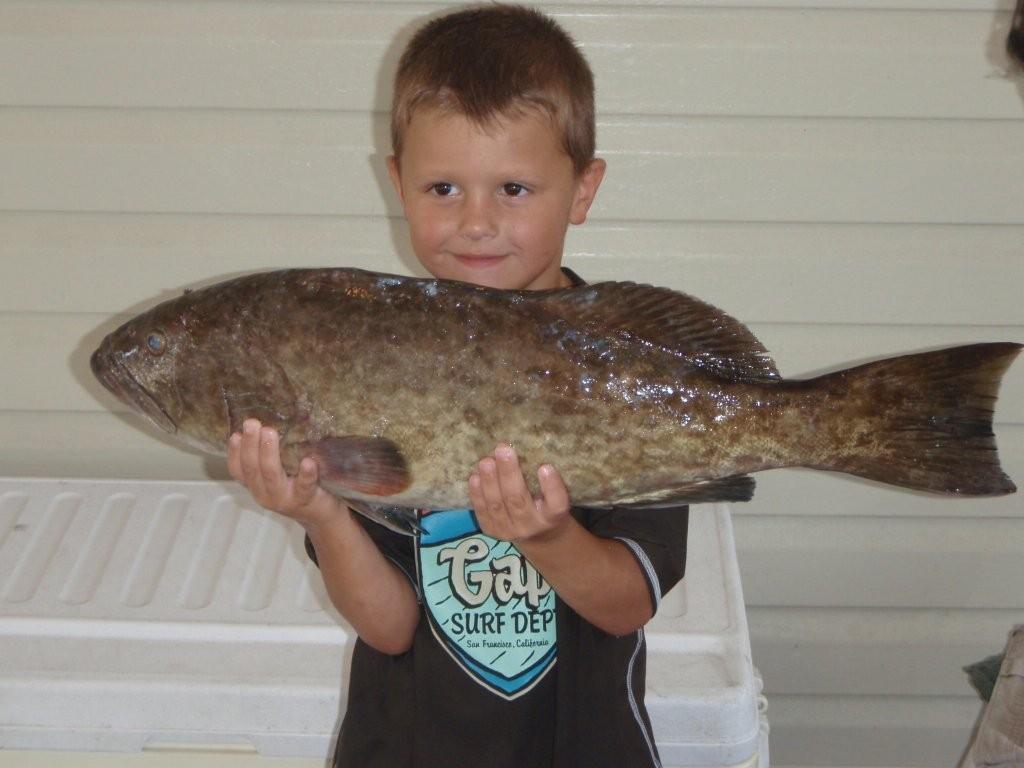 Landon with a Grouper:)