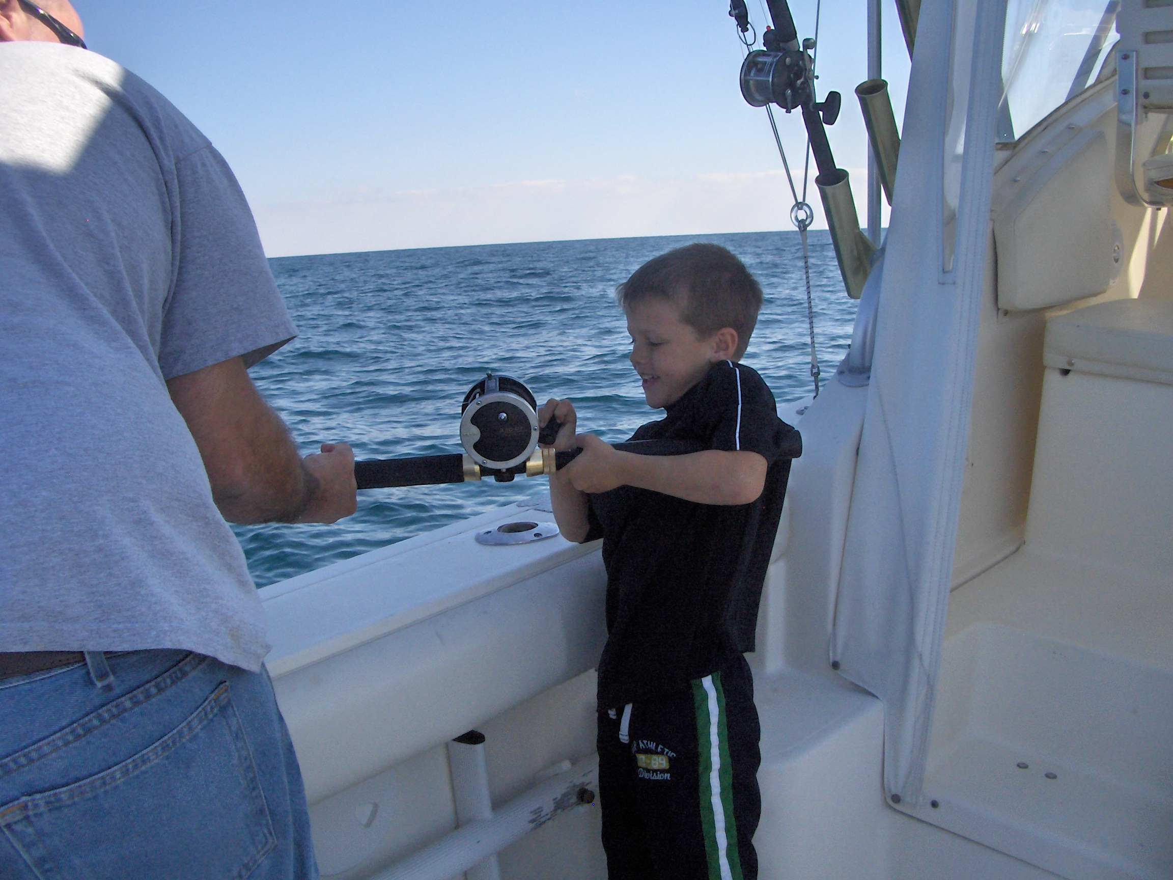 Landon gets some help with his grouper:)